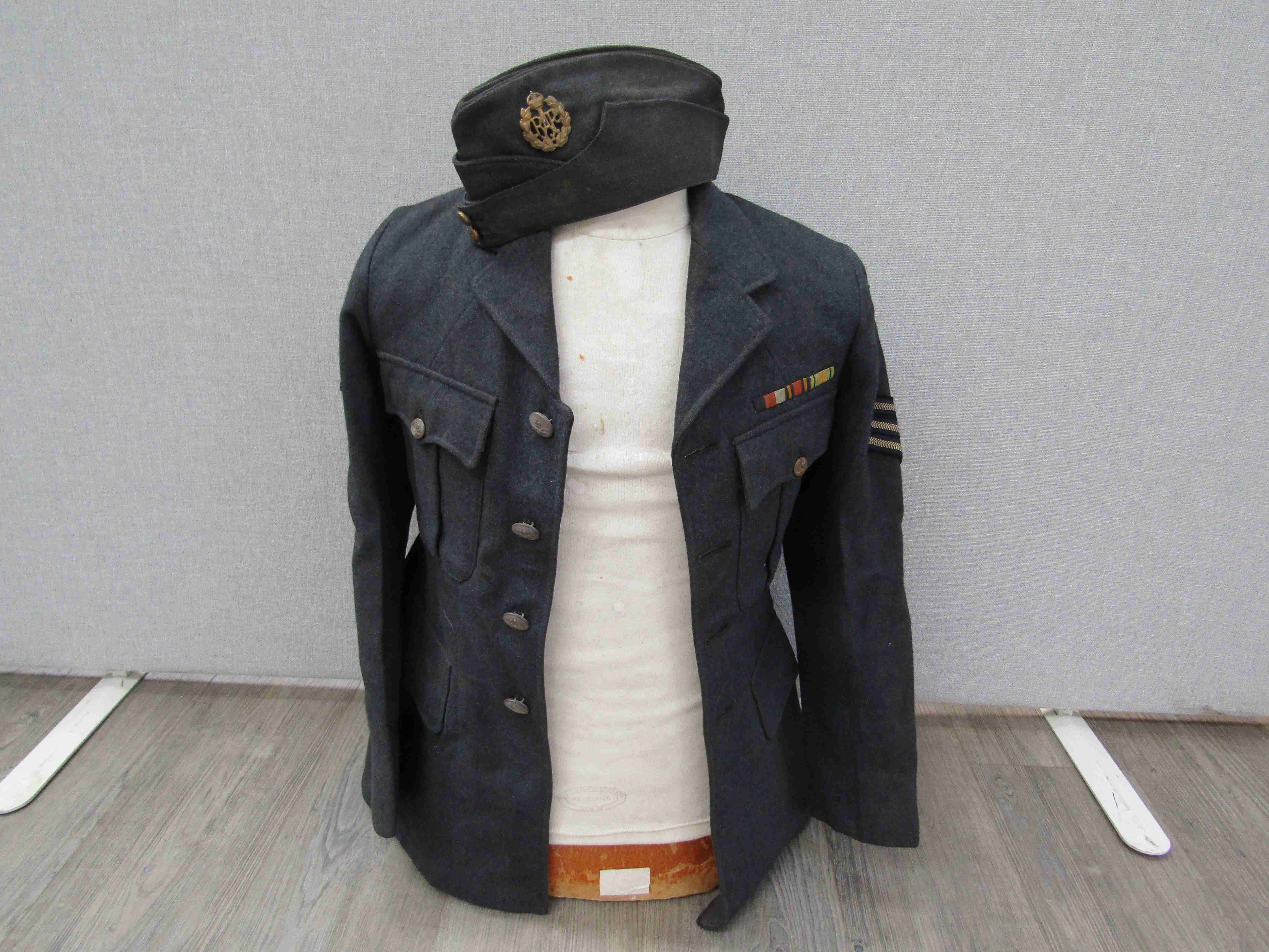 A WWII RAF Airman's service jacket with Sergeant's stripes,