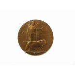 A WWI memorial plaque / bronze death penny named to Robert Hood