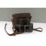 A pair of WWI era French binoculars with Machine Gun Corps "M.G." mark and S.I.