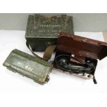 Two British military field telephone sets in brown and green