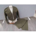 A WWII Canadian-made battledress blouse dated May 1945 together with a matching pair of battledress