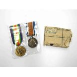 A WWI pair of medals together with box of issue named to 51645 CORPORAL H.R.