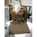 A 1940 pattern battledress blouse and trousers with US contract maker's label