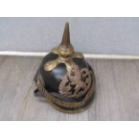 A reproduction WWI German officer's Pickelhaube helmet