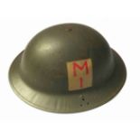 A WWII Home Guard helmet with Division patch,