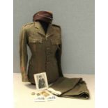 An ATS uniform jacket, skirt and side hat,