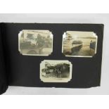 A WWII Royal Naval photograph album with approximately 100 photographs of sailors, ships etc.