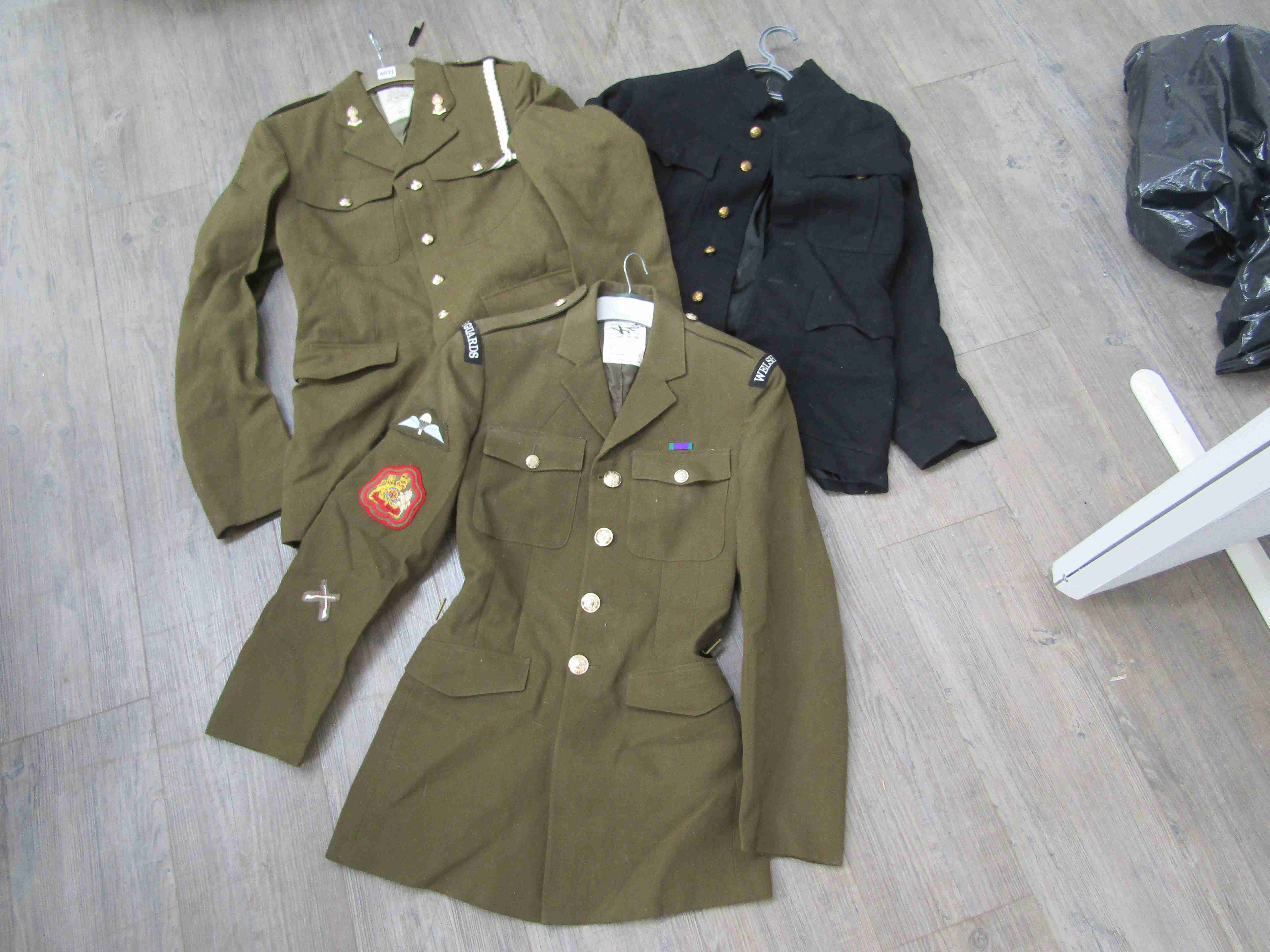 A box of mixed uniforms including Welsh Guards service dress jacket