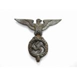 A cast metal Nazi Standard top, the eagle with spread wings over wreath surrounded Swastika.