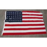 Three stitched flags: US stars and stripes with 48 stars,