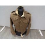 A 1940 pattern battledress blouse with RAC titles, dive patches,