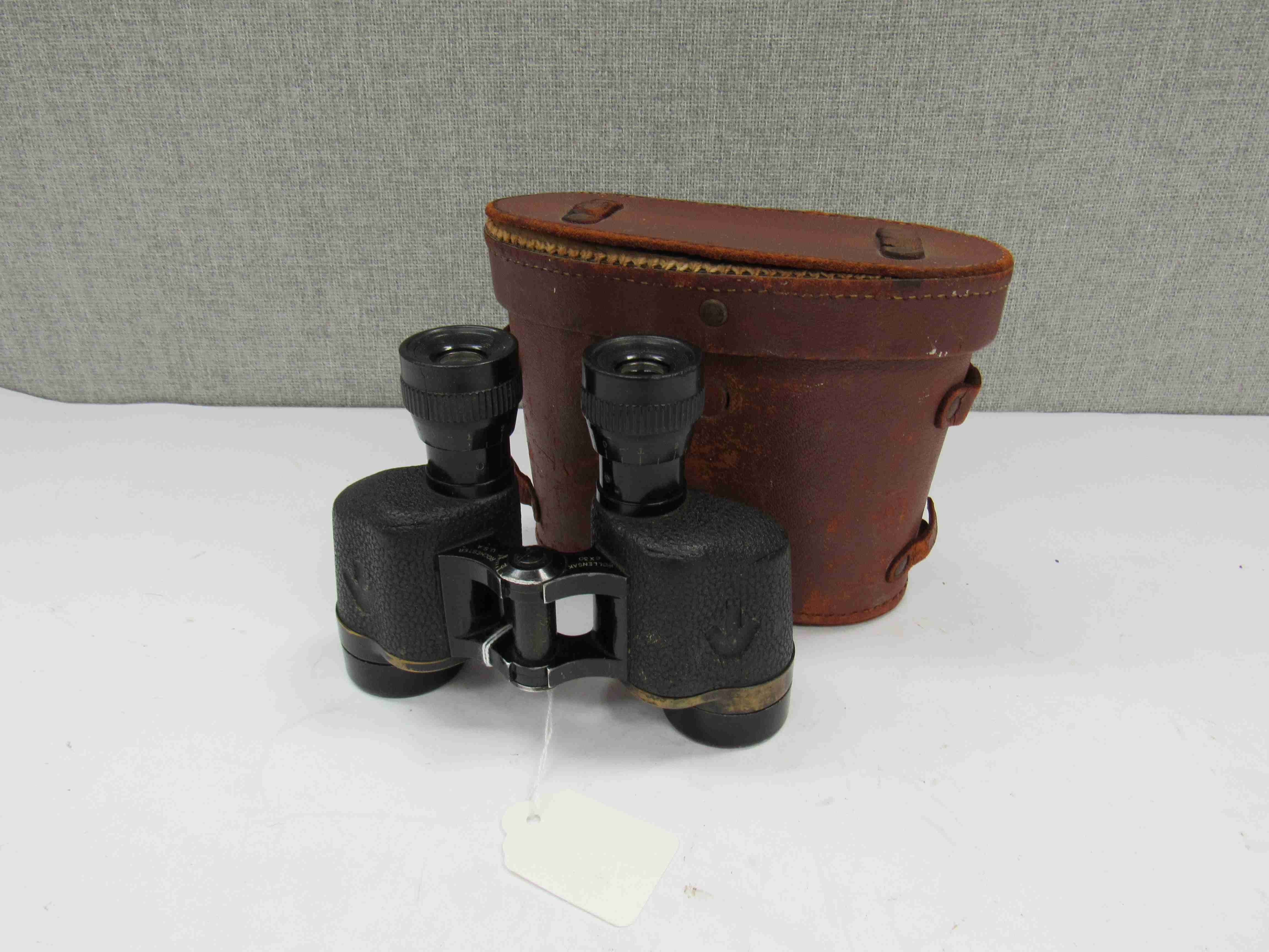 A pair of WWII Wollensak 6x30 binoculars, as issued to the British Army,