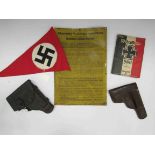 Two German leather holsters for the automatic pistol, a German metal noteboard,