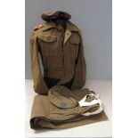 A WWII 1937 pattern battledress blouse with Devon titles, dive patches and Lieutenant's pips,