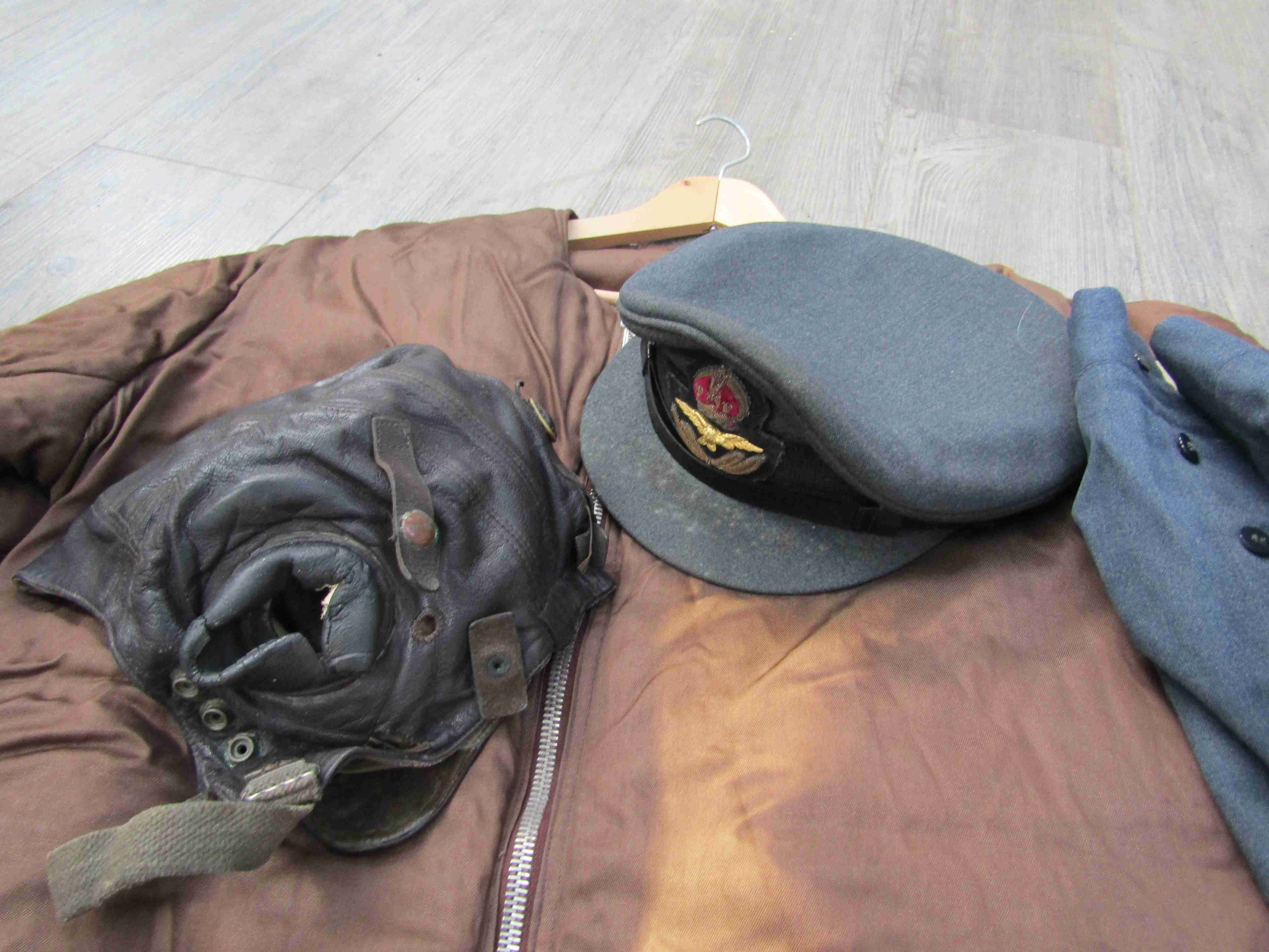 An RAF pilot's uniform with jacket, trousers and hat with King's crown badges and buttons, - Image 2 of 7