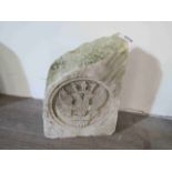 A two headed eagle carved limestone wall insert crest