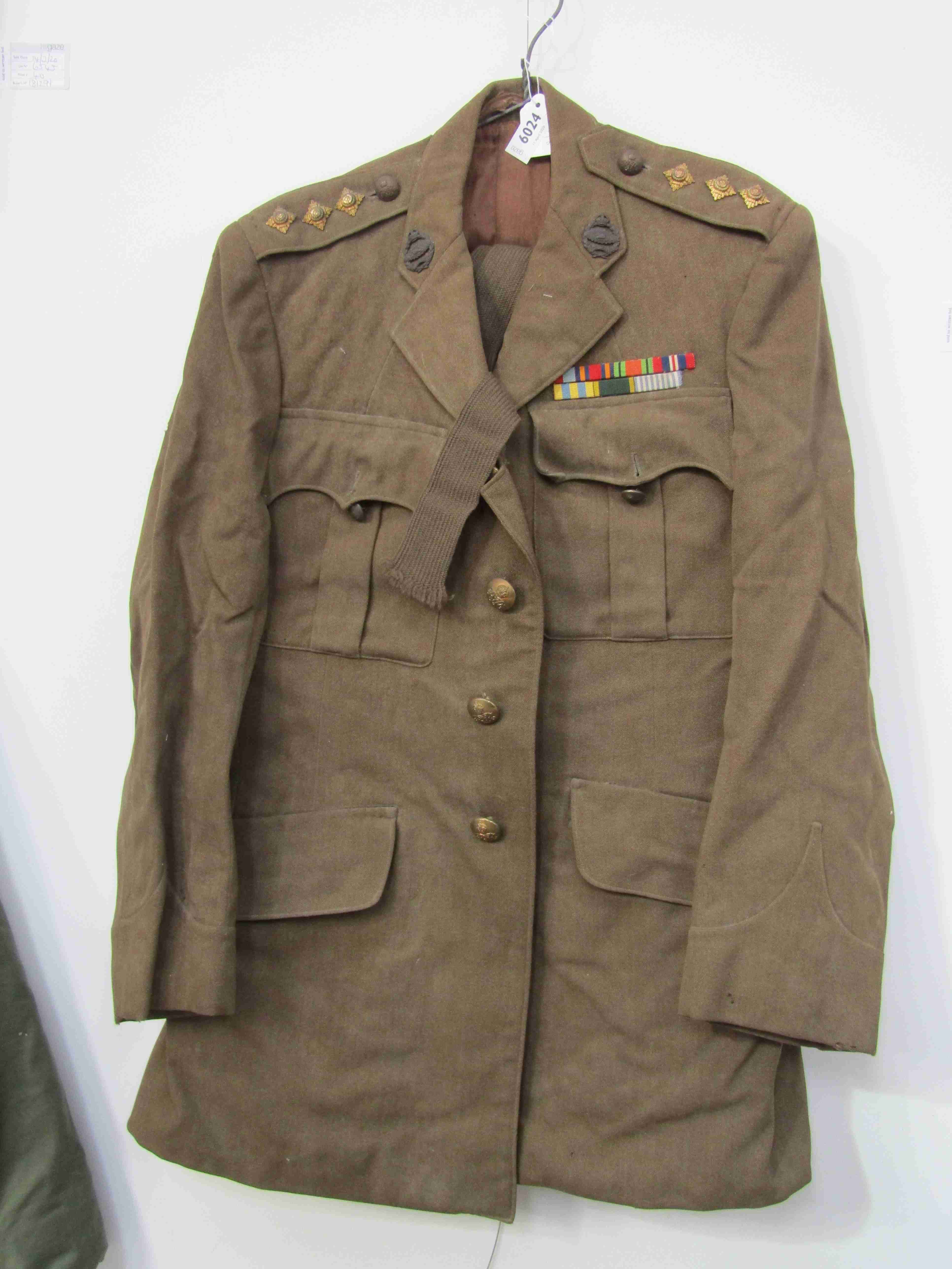 A WWII Royal Tank Corps officer's uniform with insignia,