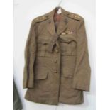 A WWII Royal Tank Corps officer's uniform with insignia,