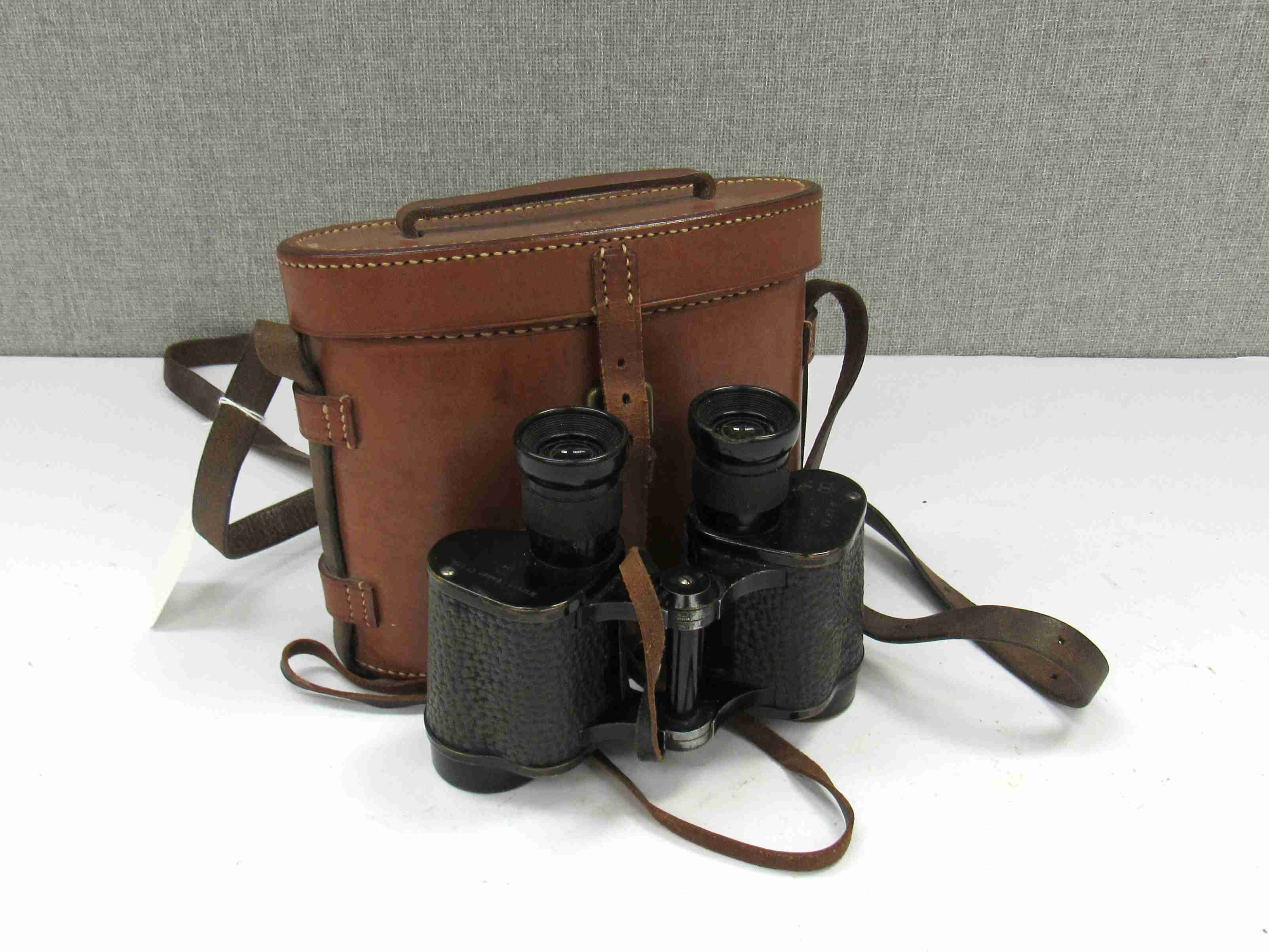 A pair of WWII Watson & Backer x6 binoculars with 1941 AM markings,