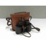 A pair of WWII Watson & Backer x6 binoculars with 1941 AM markings,