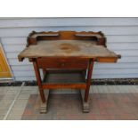 A Victorian oak watchmaker's bench with fitted vice, drawer with key and under-shelf, 103cm (h) x