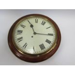 An early 20th Century mahogany cased 12'' dial clock with painted metal Roman dial, driven by an 8-