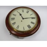 An early 20th Century oak school/station clock with a 12'' Roman dial, 8 day movement with going