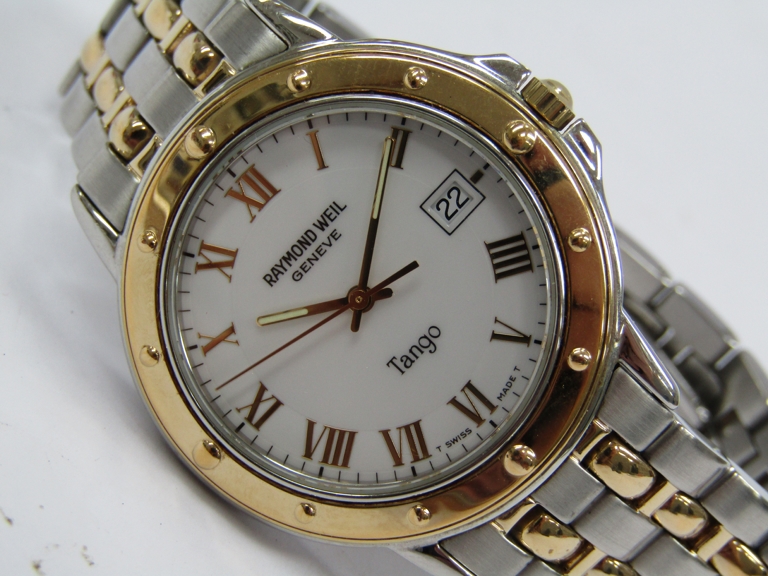 RAYMOND WEIL: A gentlemans stainless steel and gold plated 'Tango' quartz bracelet watch with centre