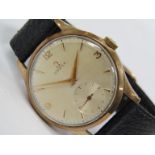 OMEGA: A 9ct gold cased 1950's gentleman's wristwatch, silvered dial with subsidiary seconds, gilt