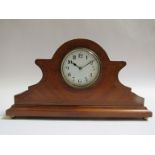 An Edwardian mahogany and string inlaid desk timepiece with enamelled Arabic dial and French