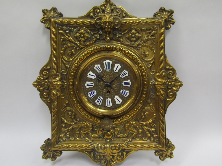 A 19th Century brass repousse wall timepiece with cartouche Roman enamel dial, possibly by Farcot,