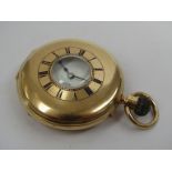 An early 20th Century 18ct gold half hunter pocket watch, Roman enamelled dial with subsidiary