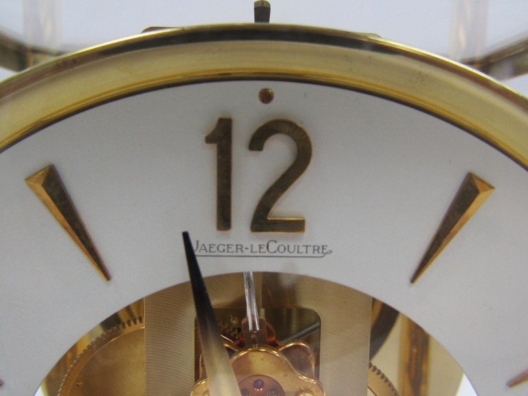 A Jaeger LeCoultre Atmos clock, no. 277969, in gilt brass and glazed casing, LeCoultre caliber 528- - Image 10 of 18
