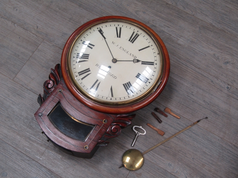 A 19th Century and later rosewood and mahogany (possible marriage) cased drop dial wall clock with