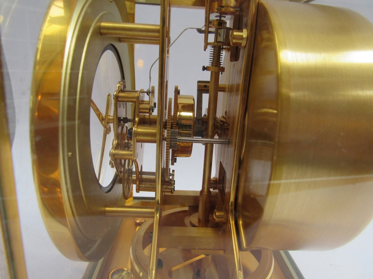 A Jaeger LeCoultre Atmos clock, no. 61654 (model 522), in gilt brass and glazed casing, patinated - Image 7 of 8