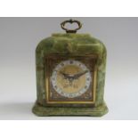 A green onyx timepiece with Elliott movement, retailed by Thwaites & Reed, London, 17cm high