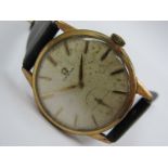 OMEGA: a gent's steel and gold plated manual wind wristwatch, case plating worn, silvered dial