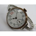 A WWI period base metal trench wristwatch, Arabic enamelled dial with red twelve, 7 jewel Swiss