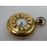 An early 20th Century 18ct gold half hunter pocket watch by H. T. Miles, Roman enamelled dial with