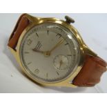 A Junghans gold plated and steel cased gents automatic wristwatch, silvered dial with subsidiary