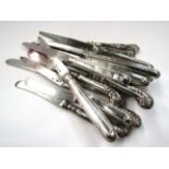 19 silver plate knives