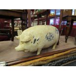 A fibreglass shop display pig