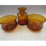 Erik Hoglund - A pair of Boda amber glass bowls with internal bubbles, etched No.