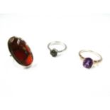 A copper mojave carnelian sterling silver ring. A Zambian amethyst sterling silver ring.