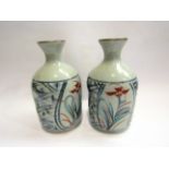 A pair of Oriental vases lattice effect,