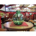 A green glass carboy