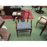 A George III mahogany open arm chair with humped cresting rail, pierced splat and drop-in seat,