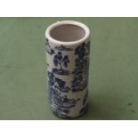 A blue and white ceramic umbrella/stick stand.