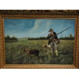 A large gilt framed print and oil on canvas depicting hunstman smoking pipe with hounds in grassy
