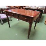 A William IV mahogany writing desk the gilt tooled leather writing surface over two frieze drawers